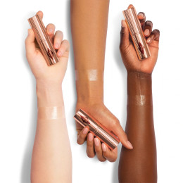 Кремовый хайлайтер в стике Charlotte Tilbury Unreal Highlighter - Glazed Goddess Universal Shade